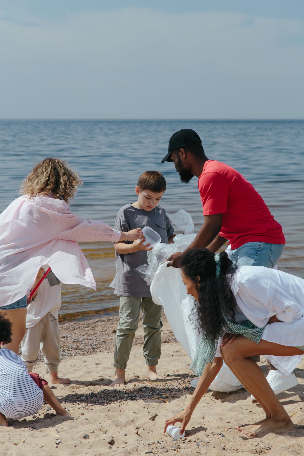 A community clearing plastic from the beach